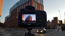 Camera set up to photograph a building