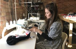 Beatrice Russell sewing one of her premium prototype sports garments